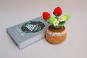 Handmade crochet strawberry potted plant, cute wool knitted flower ornament for cozy desk decor.