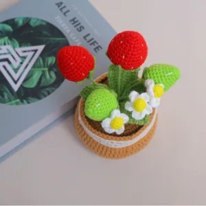 Handmade crochet strawberry potted plant, cute desktop ornament for home decor.