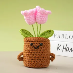 Handmade crochet potted flower ornament with cute smiley face pot, perfect for desktop home decor.