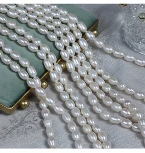 Natuurlijke zoetwaterparel strengen, ovale rijstvorm witte parels voor sieraden maken doe het zelf.