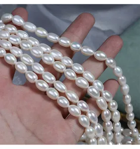 Hoogglans 7mm lange rijst vorm zoetwaterparel strangen voor handgemaakte sieraden creaties.