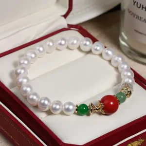 Süsswasserperlen Armband mit rotem Zinnober und grüner Edelstein im chinesischen Stil.