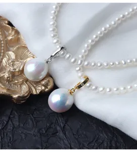 Squisita collana di perle barocche Edison 12-13mm con chiusura versatile in argento.