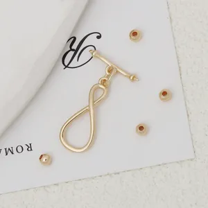 Hallazgos de joyería DIY chapados en oro cierre OT y cuentas para pulseras collares.
