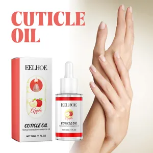 Detail shot of EELHOE apple cuticle oil bottle and packaging with hand application demo.
