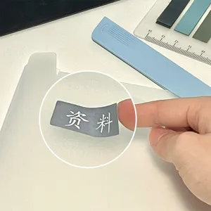 Close-up detail of the clear plastic folder showing index label slot and convenient tab insert.