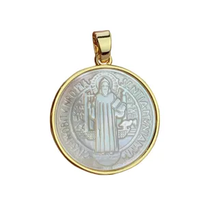 Gold-plated round natural mother of pearl pendant necklace charm with religious saint carving.