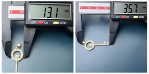 Zircon pearl key pendant detail measurement showing 13.1mm ring diameter and 35.7mm total length.