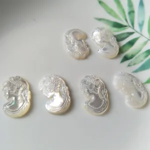 Natural mother-of-pearl carved cameo pendant charms for DIY jewelry making and craft accessories.