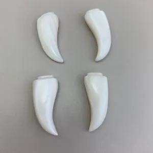 Natural white mother-of-pearl wolf tooth cabochon for DIY jewelry pendant accessories.