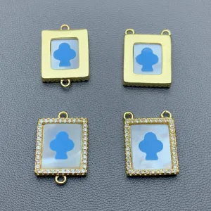 Pendentifs connecteurs de bijoux DIY dorés nacrés avec motif bleu pour colliers et bracelets chics.