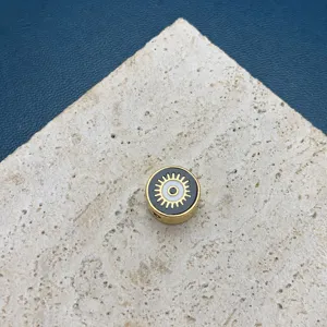 Perle ronde en métal doré avec design œil maléfique émaillé pour accessoires bijoux DIY.
