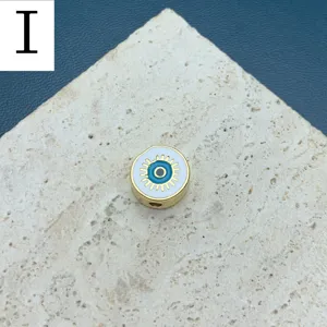 Perle œil maléfique ronde métal doré émaillé accessoire de fabrication de bijoux