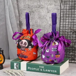 Sacs cadeaux d'Halloween avec motifs de citrouille et fantôme, sachets en tissu pour fête d'enfants.