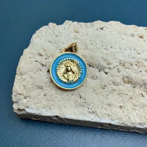 Gold-plated metal pendant featuring blue enamel and embossed Mary motif for DIY jewelry making accessories.