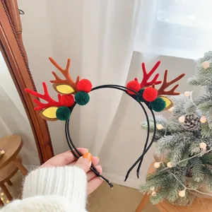 Cerchietto natalizio con corna di renna pompon rossi verdi accessorio per capelli festa