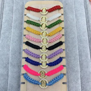 Bohemian braided rope bracelet with Guadalupe rhinestone pendant, multi-color adjustable jewelry.