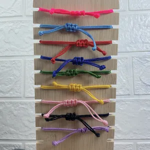 Colorful braided rope bracelets set, adjustable handmade woven wristbands for women daily wear.