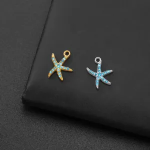 Blue rhinestone starfish charm detail view, metal DIY jewelry pendant accessory for handmade crafts.