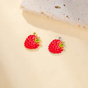 Stainless steel raspberry pendant detail, colorful enamel fruit DIY jewelry charm close-up
