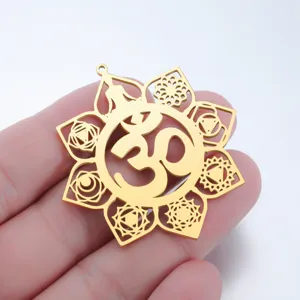 Close-up detail view of golden stainless steel OM yoga lotus pendant fashion accessory.