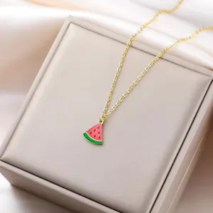 Close-up detail shot of the cute stainless steel watermelon fruit pendant necklace display.
