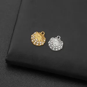 Gold and silver shell pendant detail, rhinestone encrusted titanium steel DIY charm.