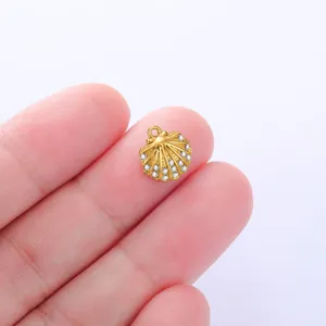 Gold shell rhinestone pendant for DIY handmade jewelry and accessories detail shot.