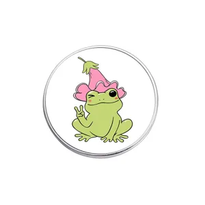 Detailed close-up of the cute cartoon frog metal brooch showcasing its vivid enamel flower hat design.
