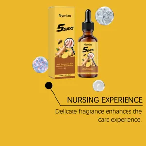 Detailed close-up of nail essence dropper, showing turmeric bee formula and smooth texture.