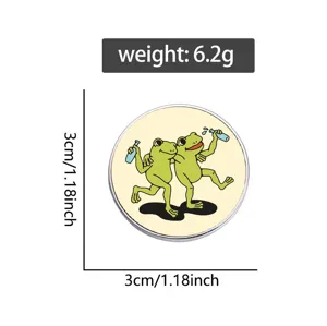 Detailed view of cute cartoon frogs drinking metal brooch pin, compact size about 3cm.