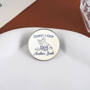 Creative cute reading duck metal brooch badge for clothes and schoolbag decoration.