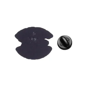 Detailed view of the black metal back and clutch of a cute cartoon mushroom brooch pin.