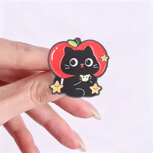 Cute black cat apple enamel pin cartoon brooch cute badge for clothes and school bags.