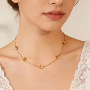 Exquisite titanium steel gold-plated daisy necklace, featuring delicate floral charms for women.