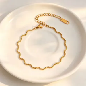Exquisite gold-colored wavy chain detail, delicate stainless steel link with extension for layering style.