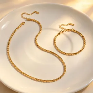 Gold twisted chain necklace and bracelet set, elegant stainless steel fashion jewelry set.