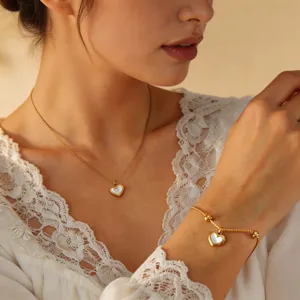 Elegant titanium steel white shell heart pendant necklace and chic matching bracelet for women.