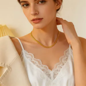 Gold herringbone chain necklace detail shot, elegant titanium steel clavicle chain jewelry.