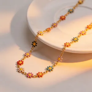 Close-up detail shot of the colorful daisy enamel titanium steel necklace with floral charms.