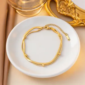 Collar de cuentas de acero de titanio de doble capa refinado, joyería dorada elegante para mujer.