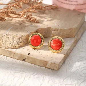 Exquisite detail of 18K gold plated stainless steel red stone stud earrings for women.