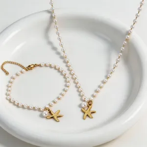 Elegant pearl starfish necklace and bracelet set, chic beach vacation jewelry gift for women.