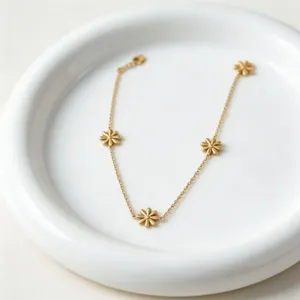 Exquisite gold flower pendant necklace featuring delicate floral charms for women daily wear.