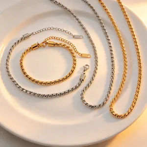 Gold and silver twisted rope chain necklace and bracelet set made of durable titanium steel.