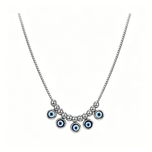 Stainless steel evil eye pendant necklace detail view, minimalist silver chain jewelry.