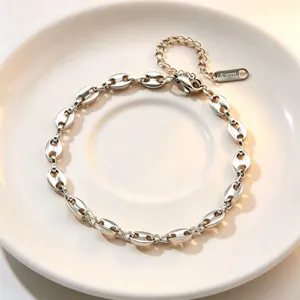 Titanium steel coffee bean chain necklace, minimalist metal link design for women daily wear.