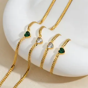 Exquisite titanium steel heart necklace featuring green and clear cubic zirconia stones.