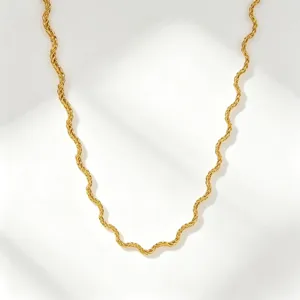 Detail view of the stylish 18k gold plated wavy chain necklace featuring a unique curved design.