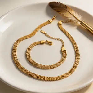 Detailed close-up view of the elegant gold titanium steel mesh snake chain jewelry set.